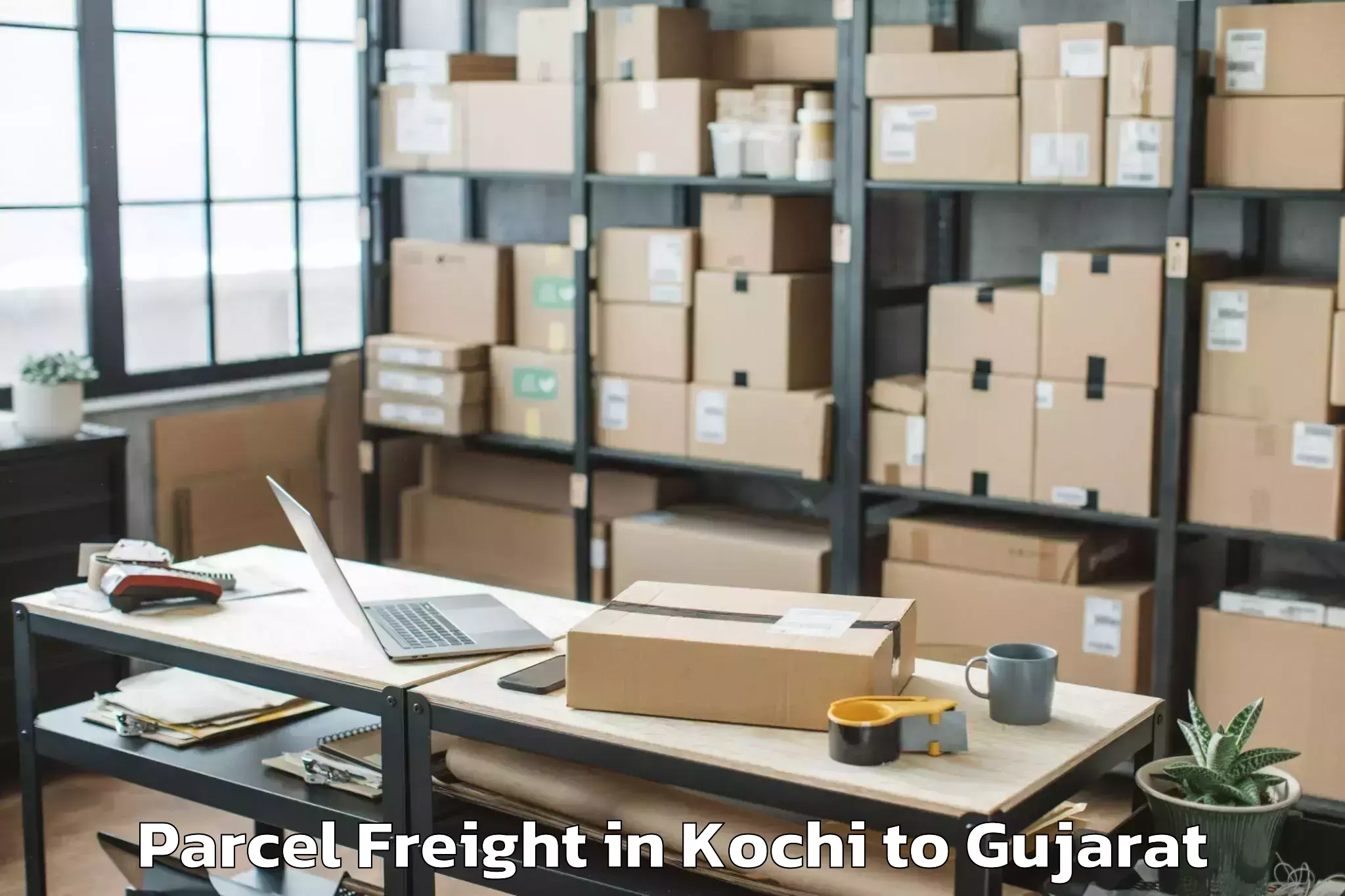 Book Kochi to Kalol Parcel Freight Online